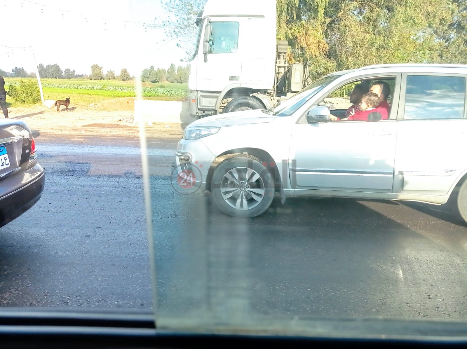 انقلاب سيارة محملة بالزيت أعلى طريق مصر - إسكندرية الزراعي