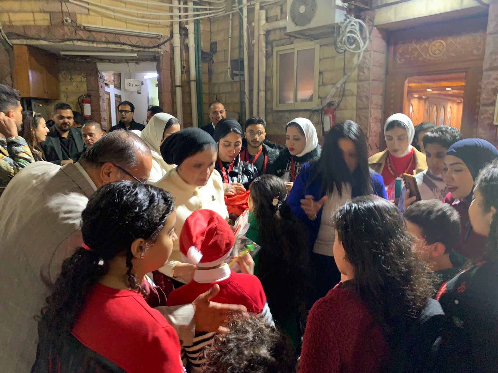 التحالف الوطني يوزع هدايا لاسعاد الصغار في عيد الميلاد ببورسعيد