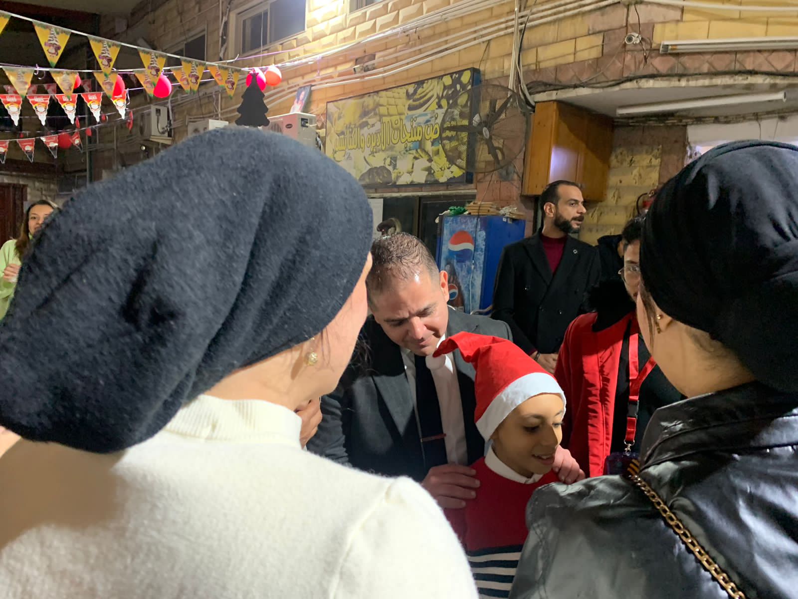 التحالف الوطني يوزع هدايا لاسعاد الصغار في عيد الميلاد ببورسعيد