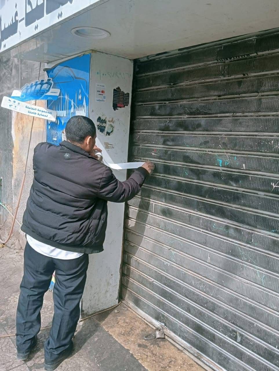 غلق وتشميع ورش مخالفة بحي مدينة نصر