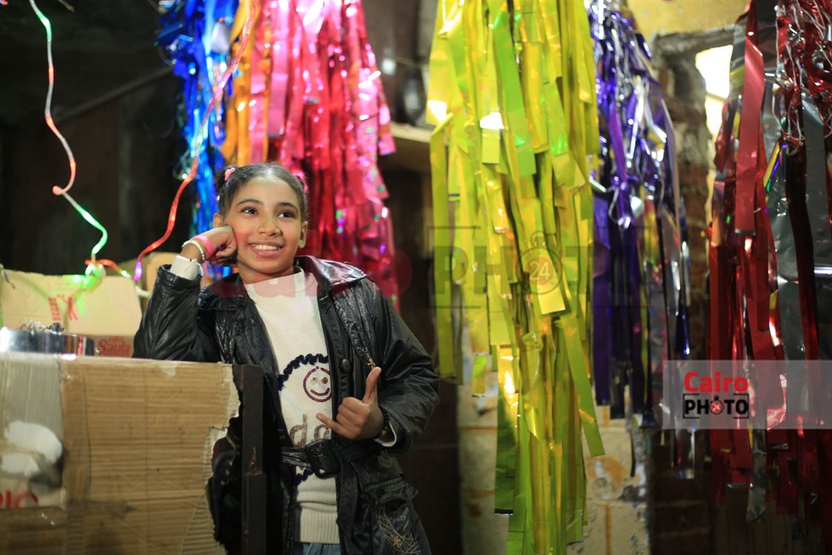 عم أمير صاحب أقدم محل لبيع الزينة في بولاق الدكرور