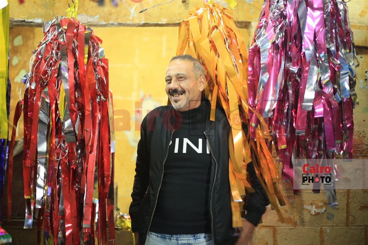 عم أمير صاحب أقدم محل لبيع الزينة في بولاق الدكرور