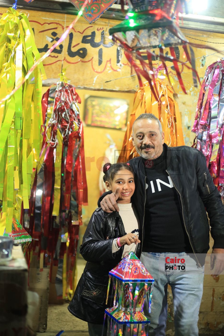 عم أمير صاحب أقدم محل لبيع الزينة في بولاق الدكرور