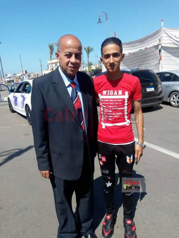 الشاب المقتول ببورسعيد ووالده 