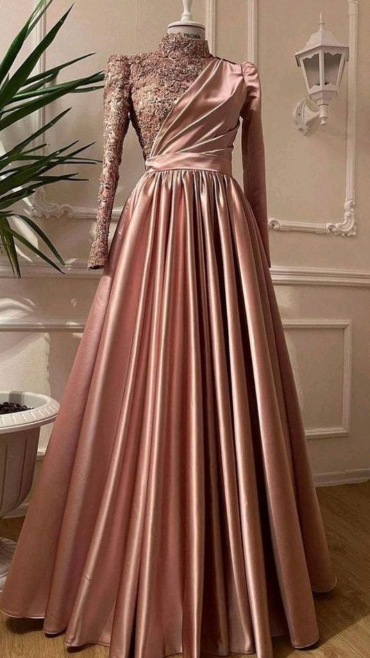  أجمل فساتين السهرة للمحجبات 2025