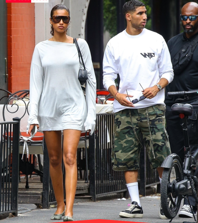 أشرف حكيمي رفقة إيمان همام