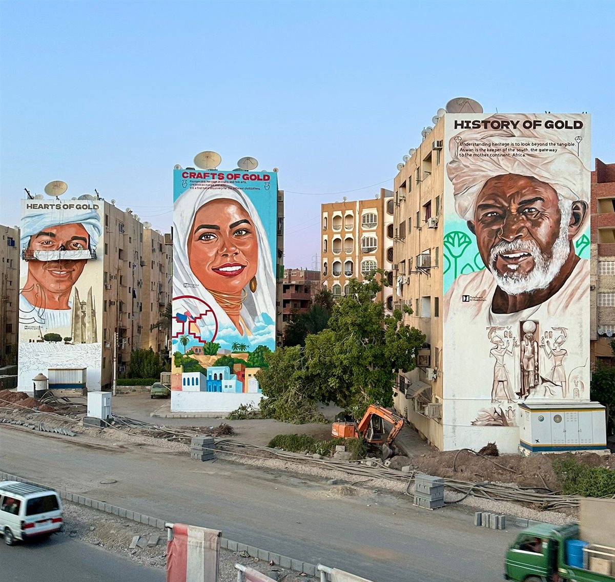 علي عبد الفتاح ومها جميل.. ثنائي جداريات الشارع يبدع في تزيين وجه أسوان