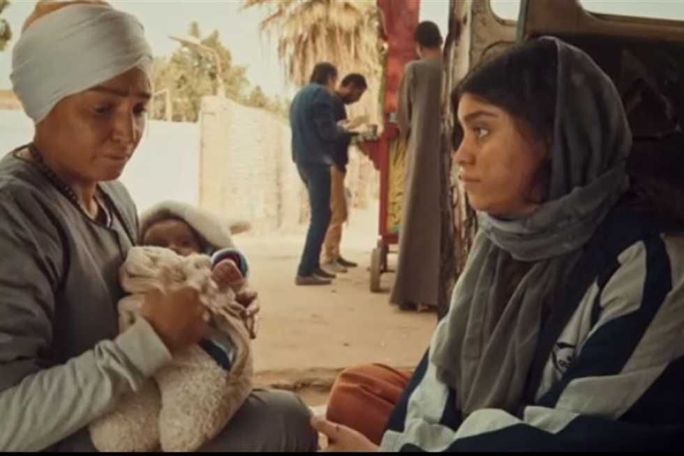 روجينا وابنتها مريم 