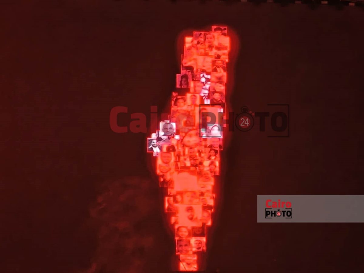 <strong>فرقة كايروكي تعرض صور لشهداء غزة في حفلها بمهرجان العلمين</strong>