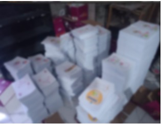 ضبط أكثر من 5 آلاف نسخة من الكتب الدراسية داخل مكتبة بدون ترخيص بالجيزة