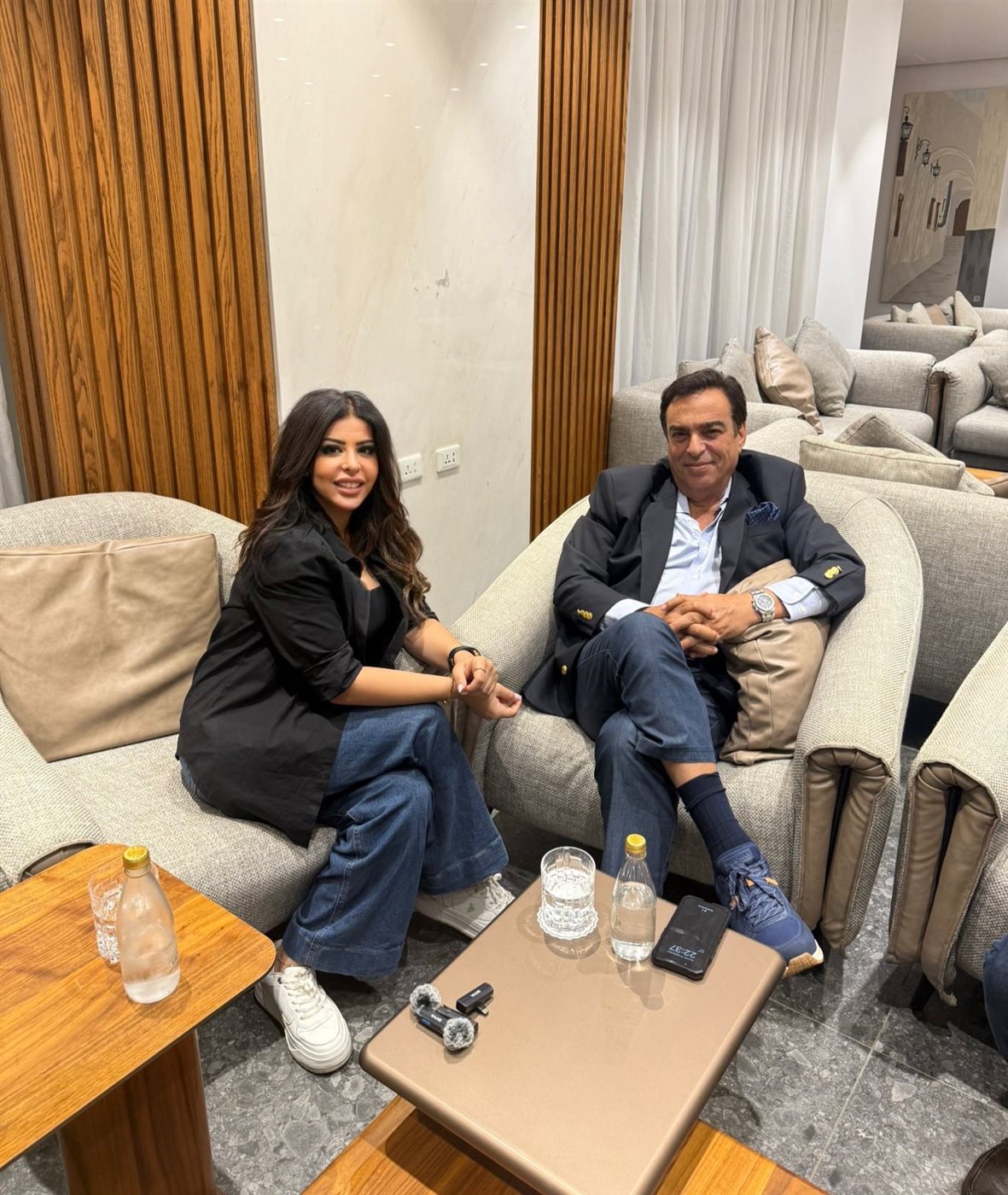 الإعلامي جورج قرداحي والصحفية دعاء خطاب