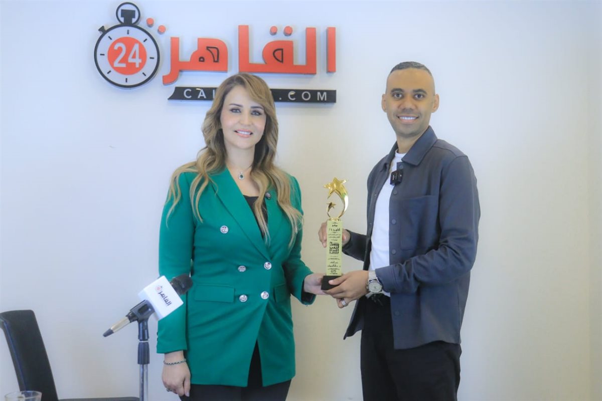 الكاتب الصحفي محمود المملوك والإعلامية داليا المتبولي