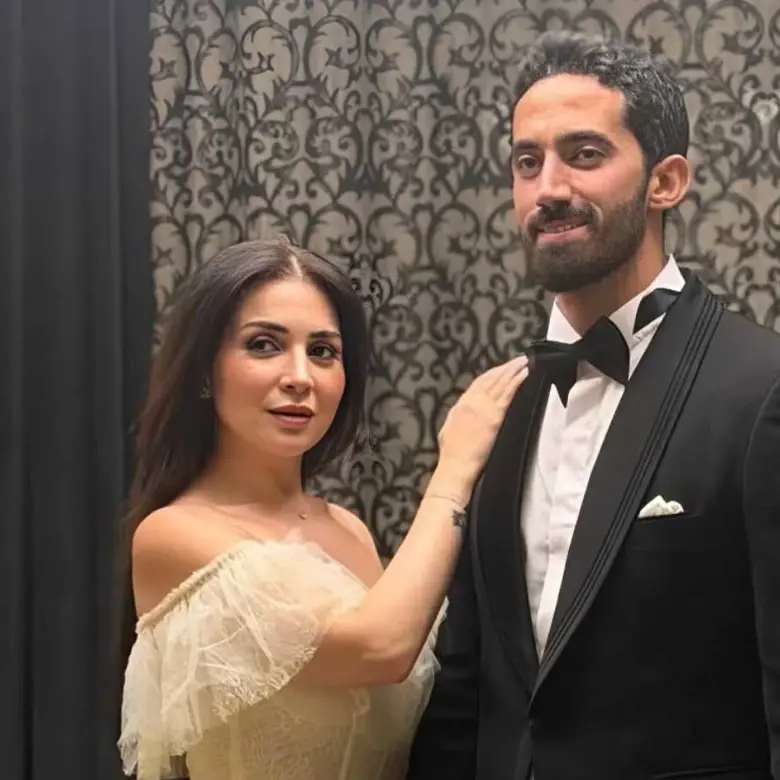 مي عز الدين وزوجها