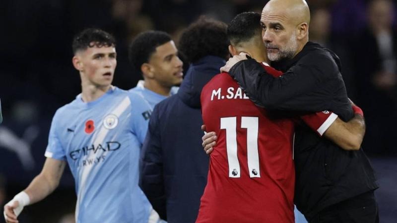 <strong>بيب جوارديولا المدير الفني لفريق مانشستر سيتي ومحمد صلاح لاعب فريق ليفربول وقائد منتخب مصر</strong>