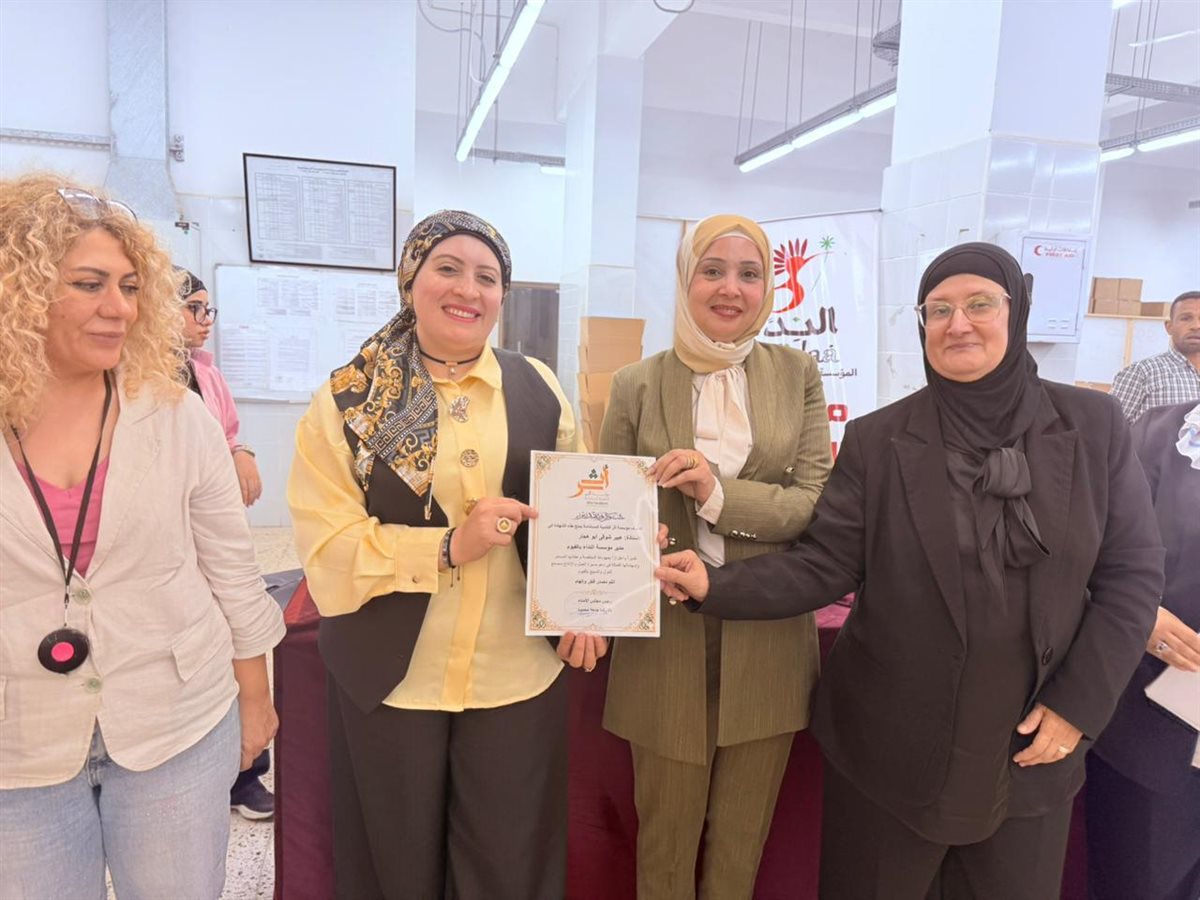 احتفالية لعيد العمال داخل مصنع الغزل والنسيج