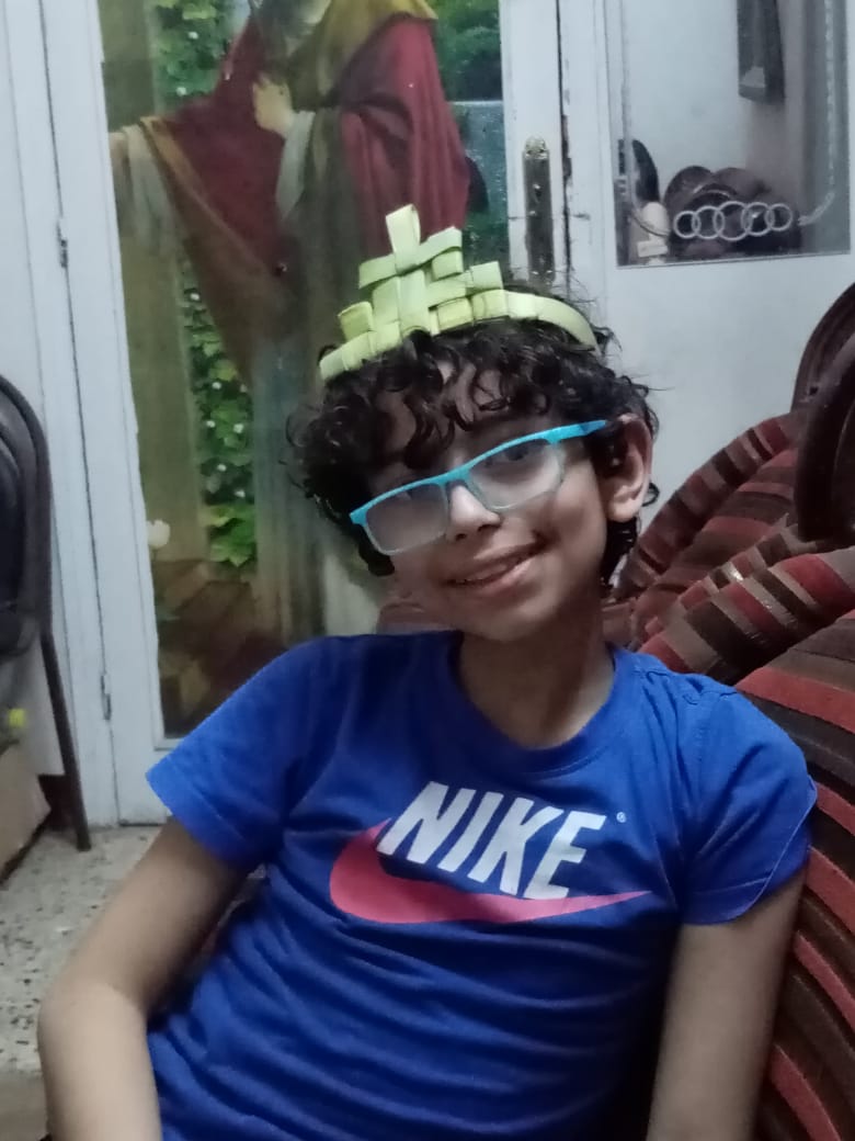 ابن الدكتورة ماريان سليمان يحتفل بعيد حد السعف في المنزل