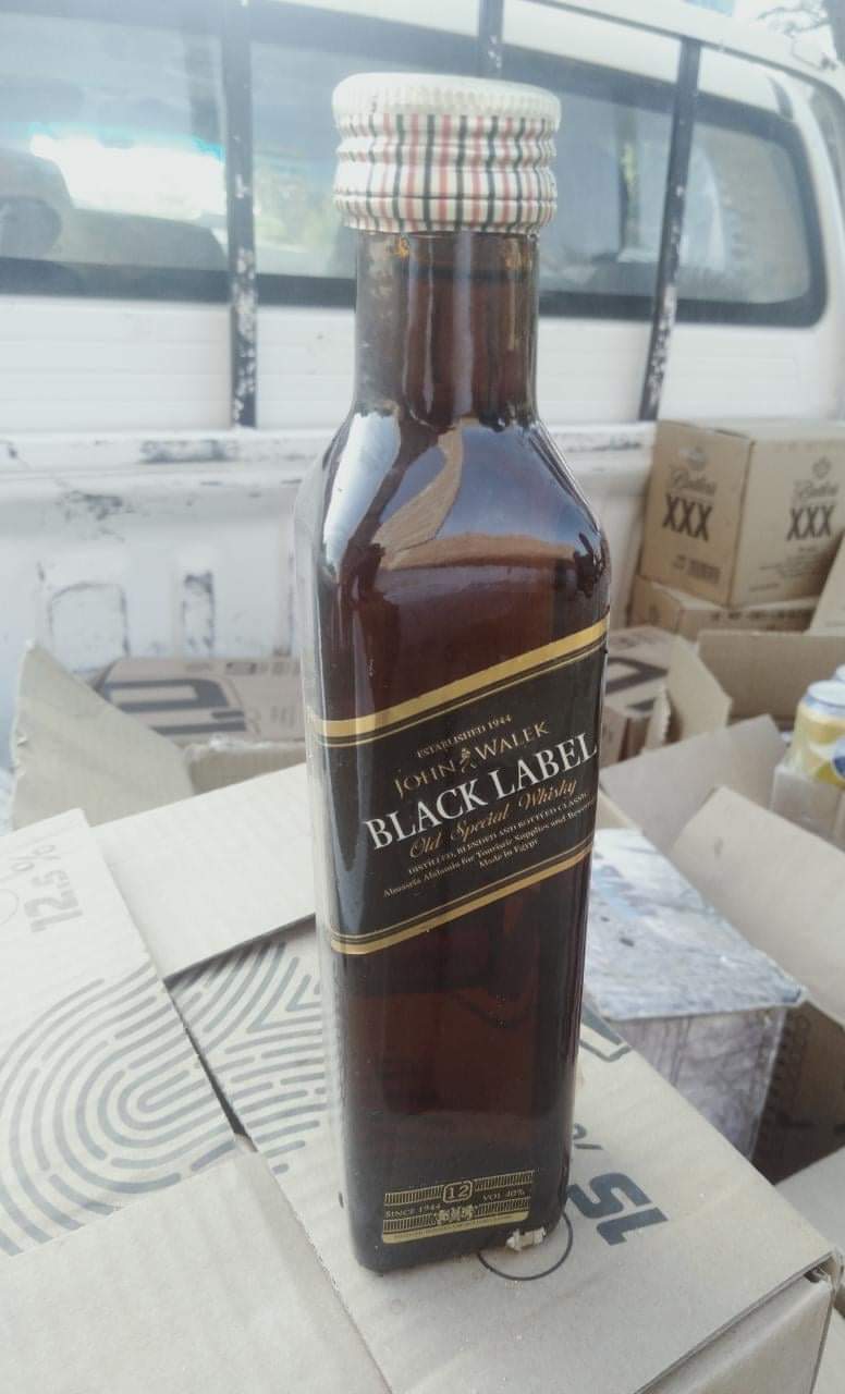 ضبط ويسكي وخمرة بالفيوم