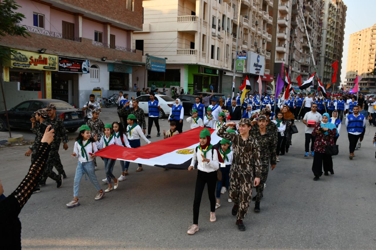 علم مصر ومسيرة رياضية تجوب الميادين.. الفيوم تحتفل بالذكرى الـ 48 لنصر أكتوبر