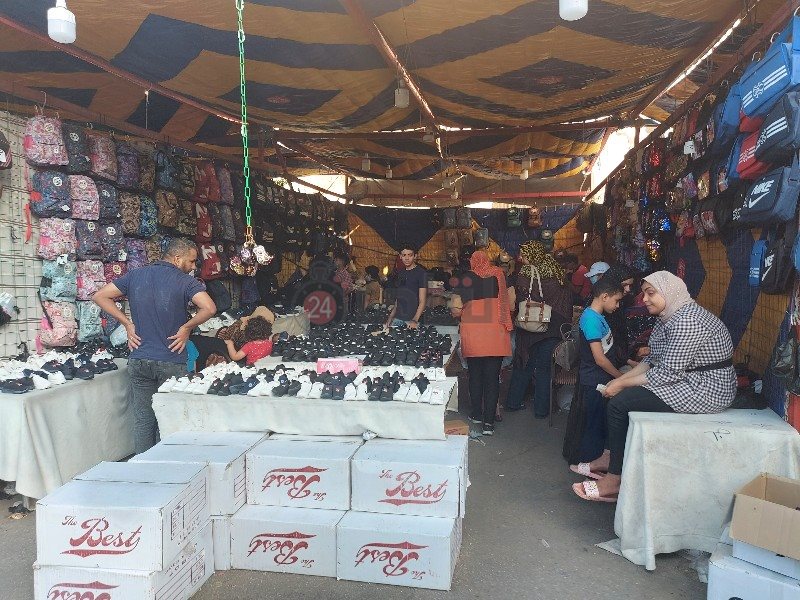 قسم للأحذية داخل معرض كلنا واحد 