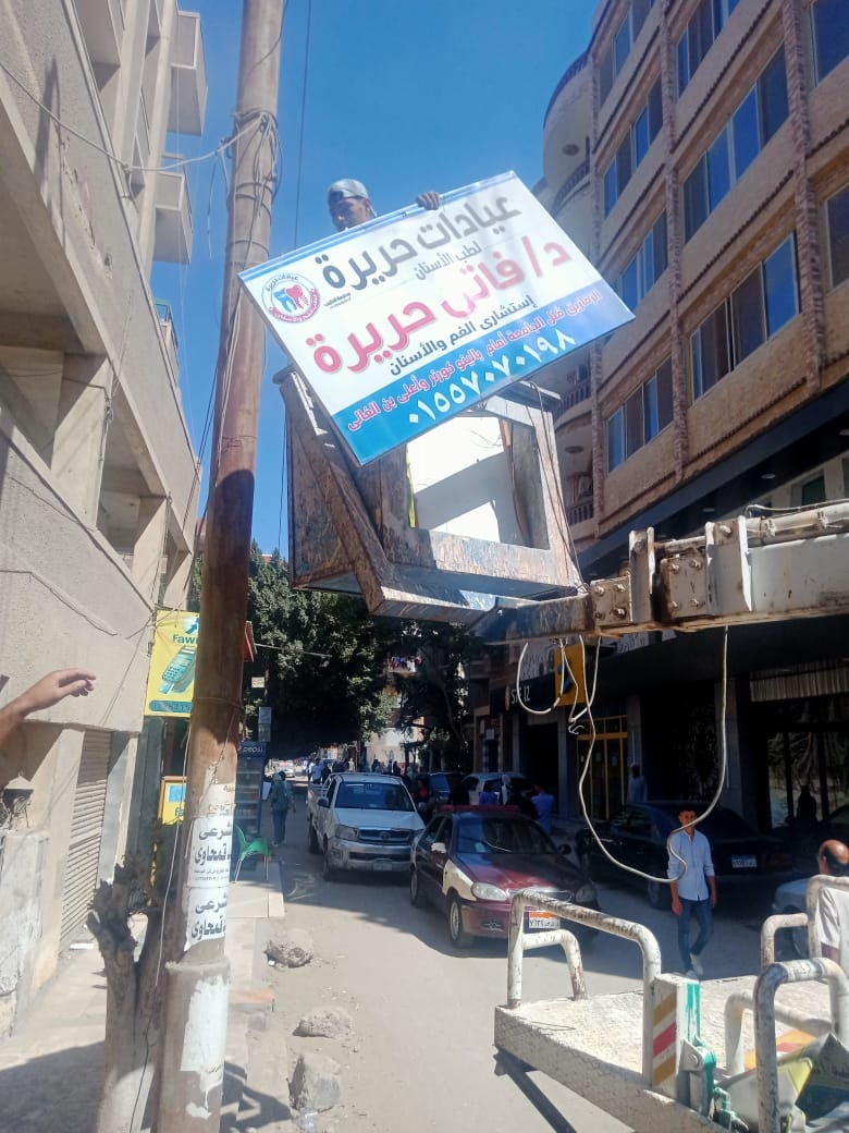 حملة لرفع الإعلانات المخالفة بالزقازيق 04