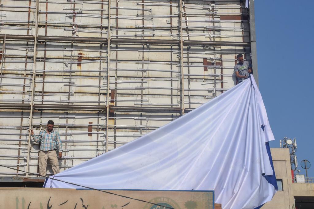 إزالة الإعلانات المخالفة في الإسكندرية 