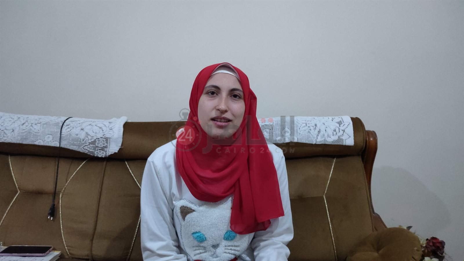إيمان أثناء حديثها لـ القاهرة 24