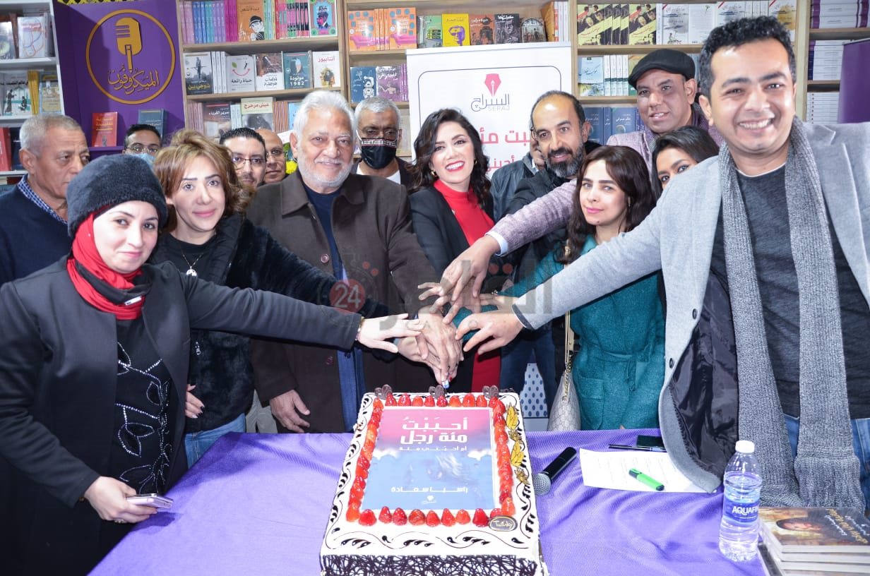 راسيا سعادة وسامح الصريطي يحتفلون بتوقيع أحببت مائة رجل