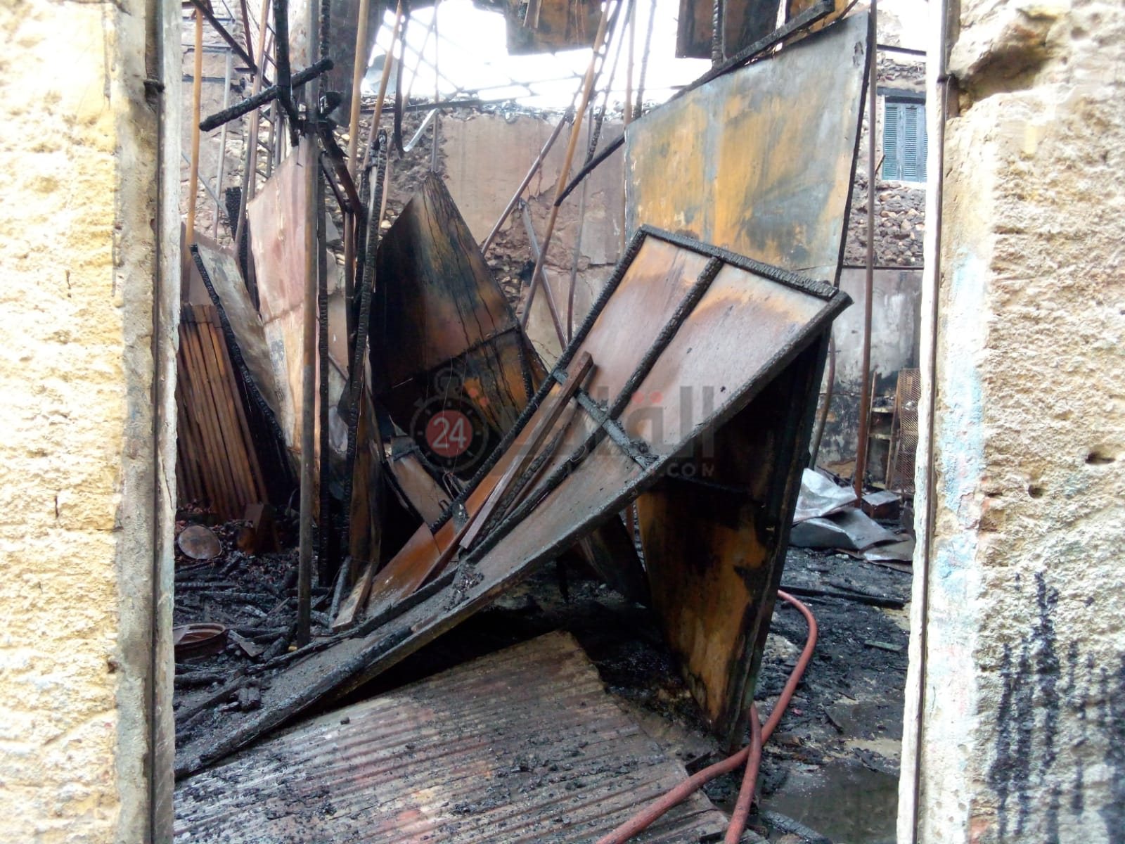 آثار حريق مخزن أخشاب بولاق أبو العلا