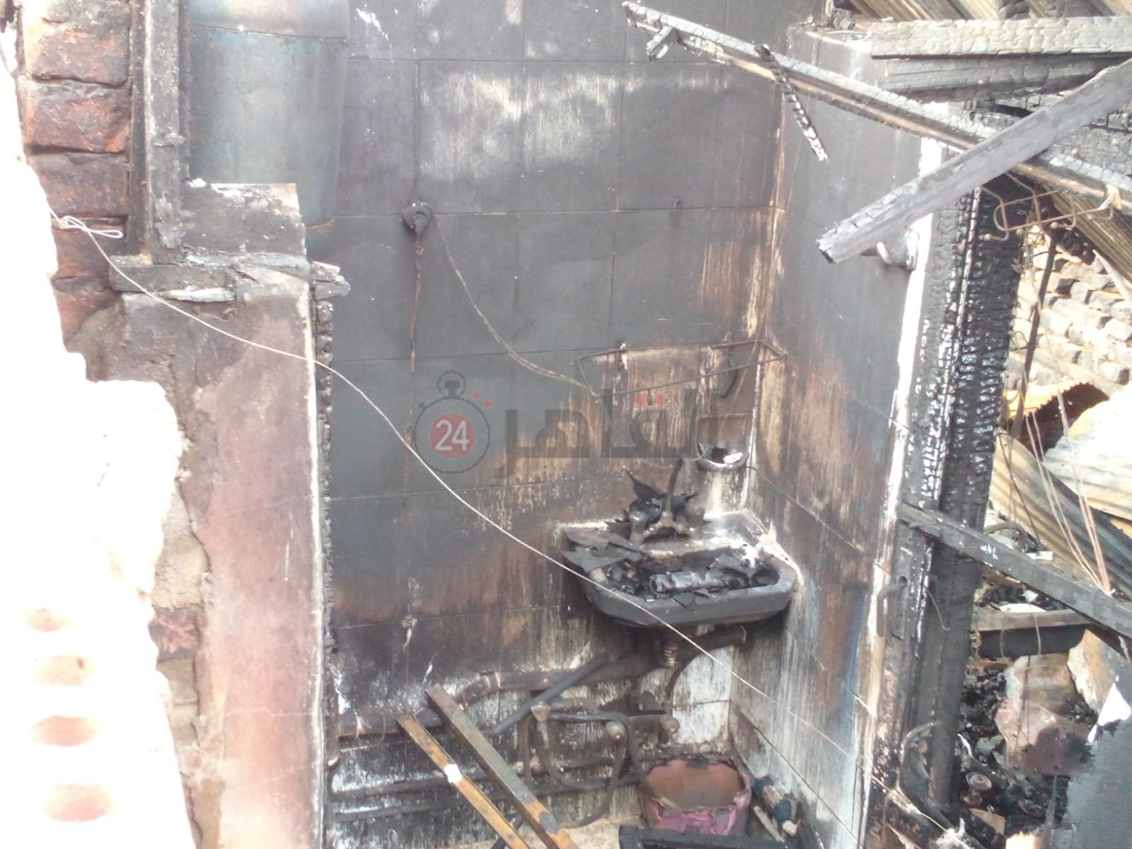 آثار حريق مخزن أخشاب بولاق أبو العلا