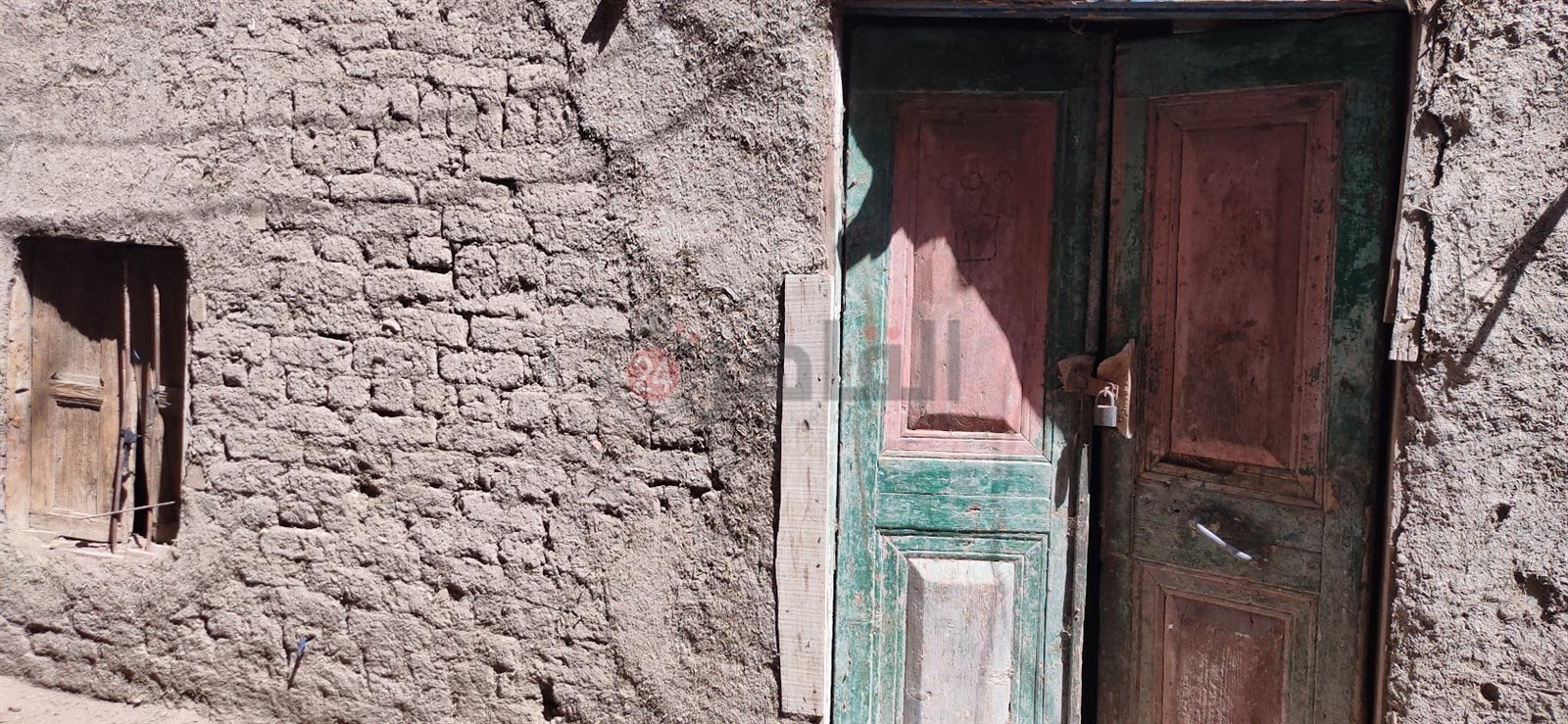 المنزل بعد انهياره 014