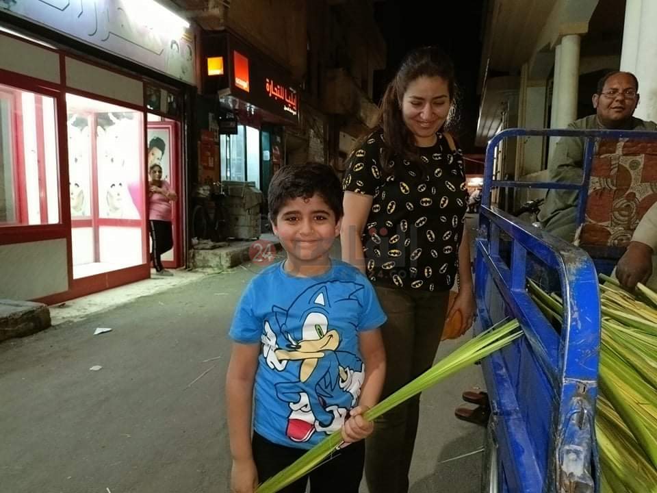 شراء سعف النخيل احتفالا بأحد الشعانين 2