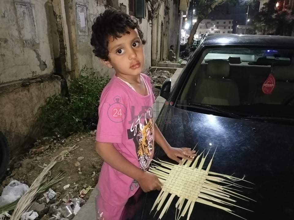 شراء سعف النخيل احتفالا بأحد الشعانين 1