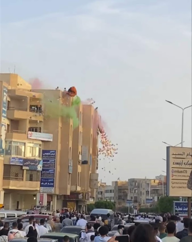 توزيع بالونات على الأطفال والمواطنين بالعاشر من رمضان 04