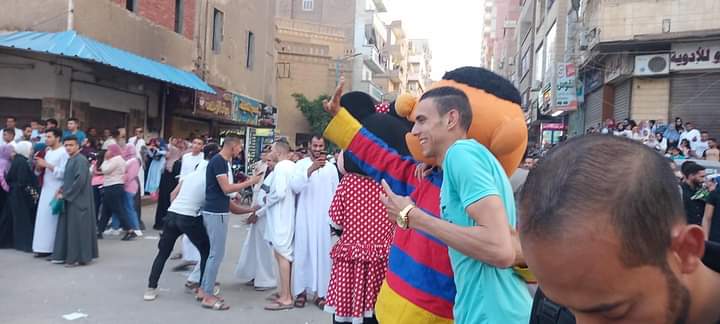 ميكي ماوس بشوارع أسيوط