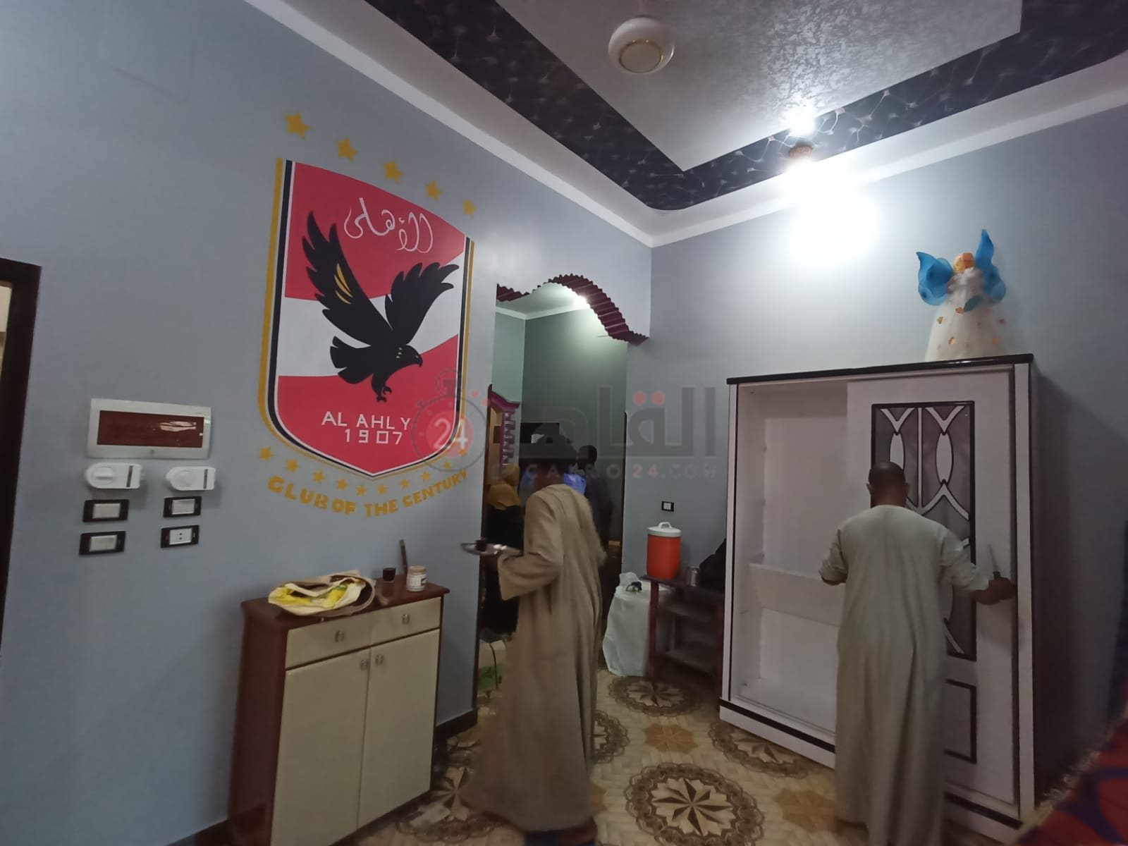 شعار الأهلي بشقة عريس الأقصر 