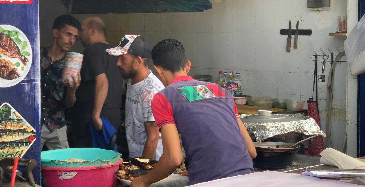 طهي الأسماك علي الجريل والفحم ببورسعيد 