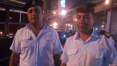 أمين شرطة يطارد سائق ميكروباص بعد هروبه بطفل في رمسيس (صور)