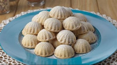  طريقة عمل الكعك بالسمن الساخن.. الوصفة الأصلية بإضافة كريم شانتيه| فيديو