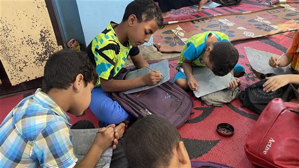 باللوح والدواية والحبر