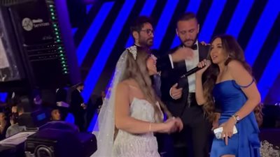 بعد انسحابها من فيلمه تاج.. هنا الزاهد ترقص على غناء تامر حسني في حفل زفاف