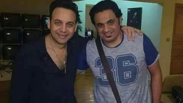 مصطفى قمر والشاعر