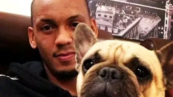 فابينيو رفقة كلبه