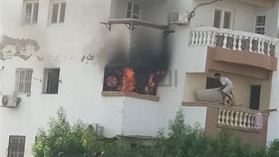 بسبب ماس كهربائى.. السيطرة على حريق في برج سكني بحي المسلة بالفيوم 