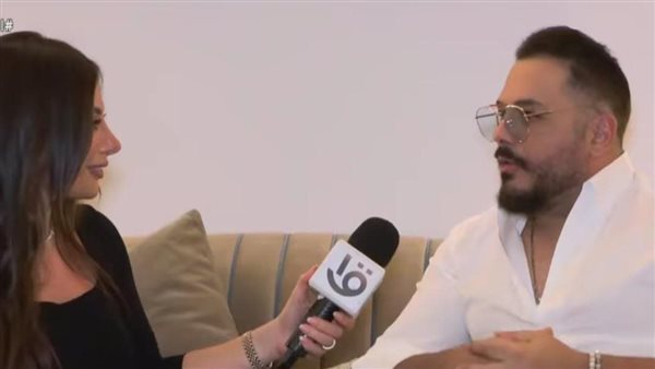 رامي عياش مع الإعلامية