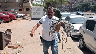 فصل الكهرباء المسروقة عن عربتي مشروبات وثالثة للمأكولات بمدينة نصر | صور