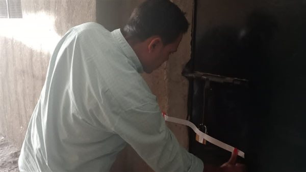 غلق وتشميع مخزن ملابس