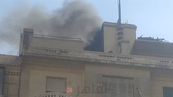 حريق أعلى عقار بجوار