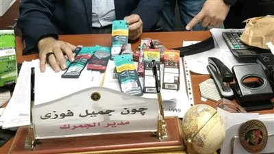 ضبط 10 علب سجائر إلكترونية تحتوي على الحشيش بمطار القاهرة | صور