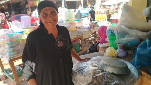 أم عائشة بائعة السمك