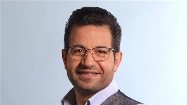 المذيع أيمن عزام